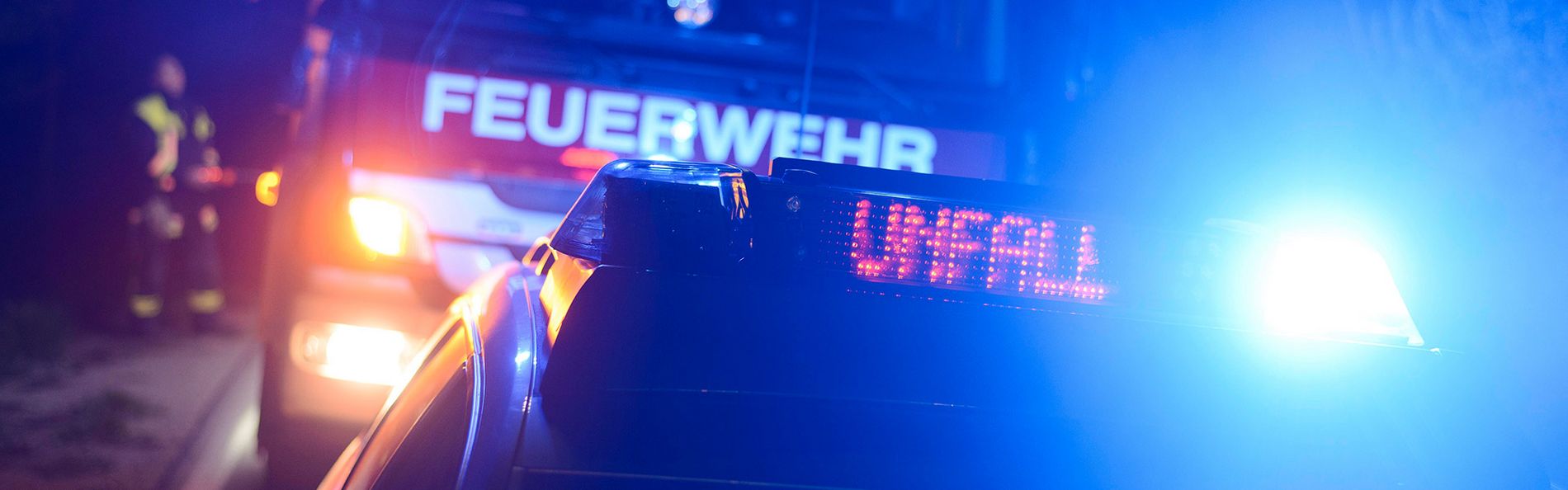 Blaulicht mit Feuerwehr- und Polizeiauto